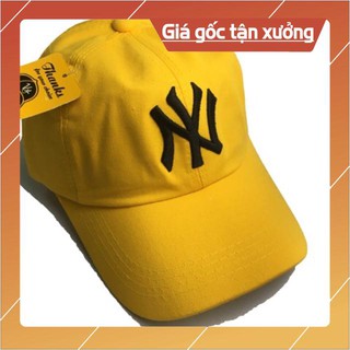 Mũ NY màu vàng đậm .