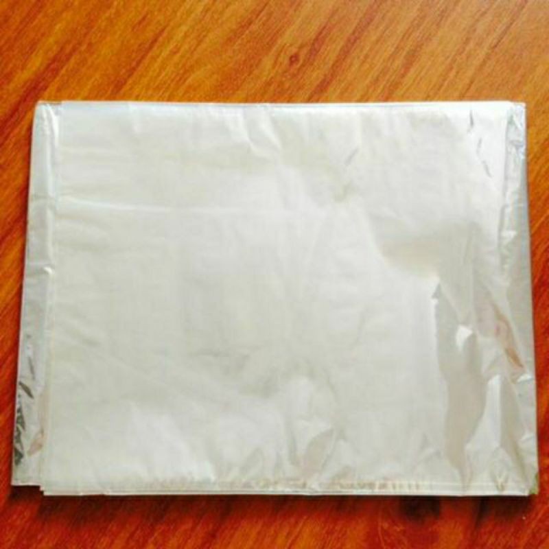 GIÁ GỐC: 1kg Giấy bóng kiếng trắng cắt sẵn gói Mứt me, mứt mãng cầu, kẹo Tết, giấy bọc oản