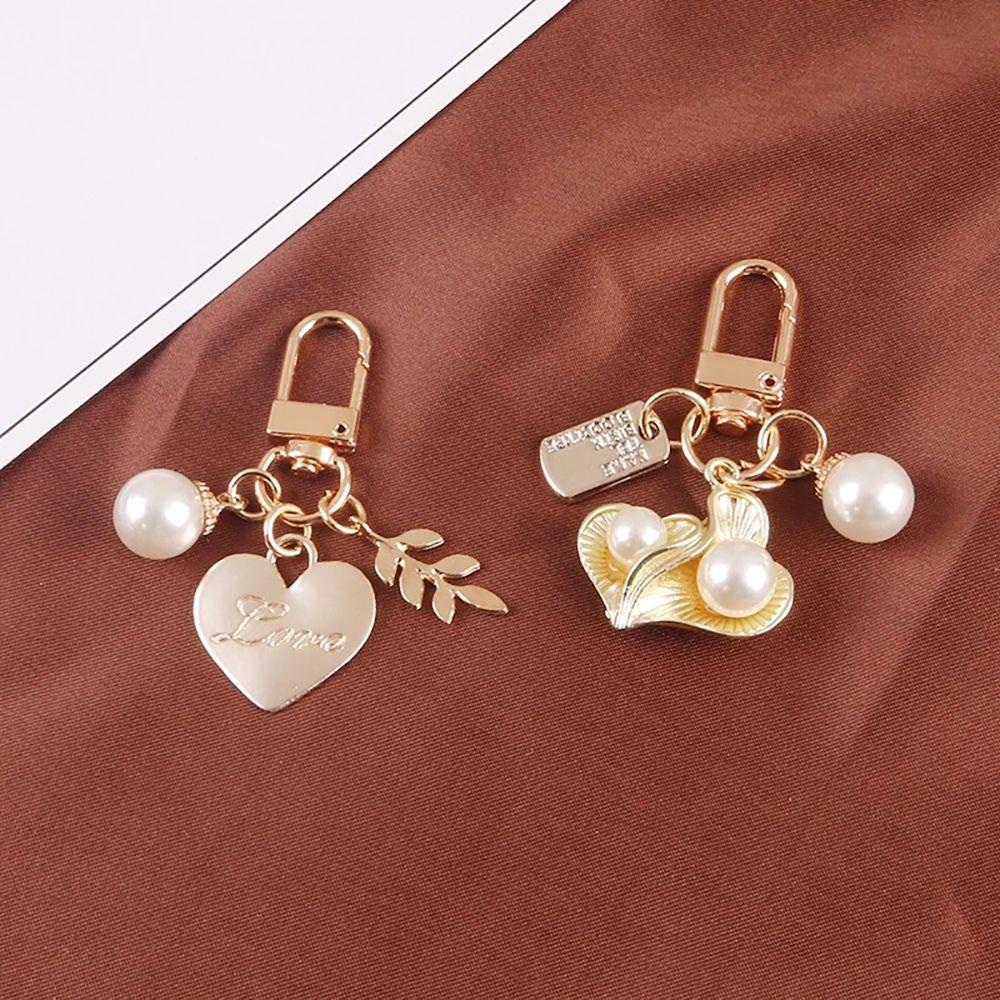 Móc Khóa Hình Trái Tim Vỏ Sò Bằng Kim Loại Phong Cách Hàn Quốc Dễ Thương Dành Cho Học Sinh Nữ