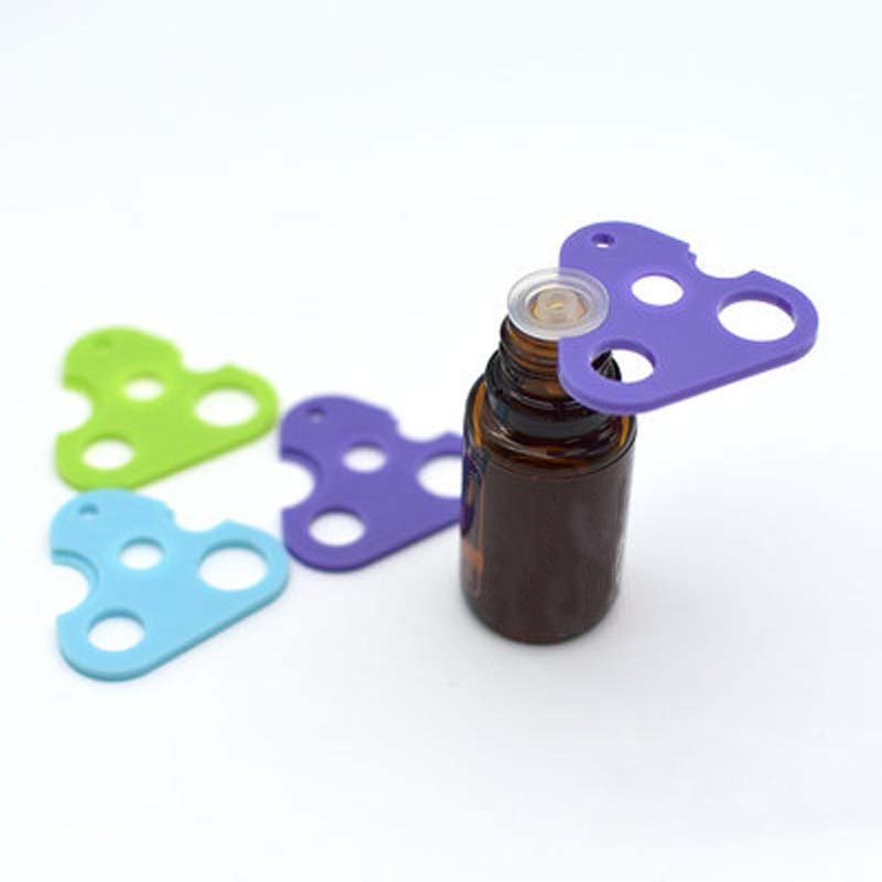 Dụng cụ mở nắp chai tinh dầu hình tam giác bằng nhựa đa năng màu sắc ngẫu nhiên