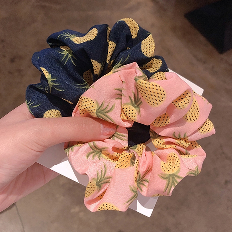 Thun cột tóc hình trái dừa phong cách thời trang dễ thương cho phái nữ