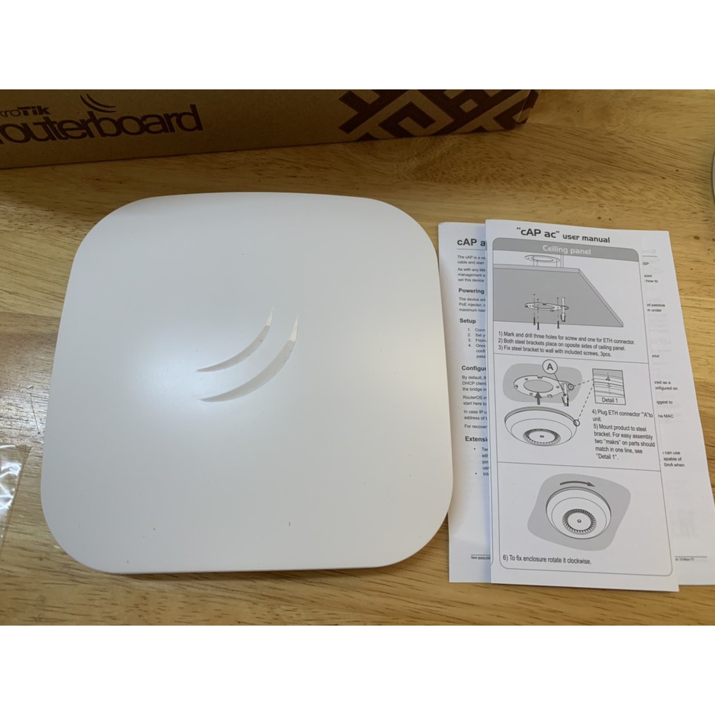 Thiết bị Router Wifi MikroTik cAP ac RBcAPGi-5acD2nD Gigabit không dây hai băng tần