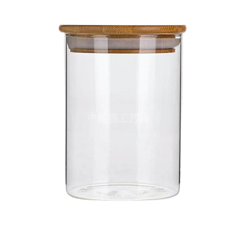 Hũ thủy tinh nắp gỗ có zoang cao 12cm,đường kính 6cm