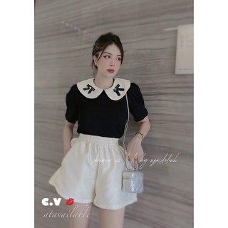 Áo sơmi cổ sen nơ đá