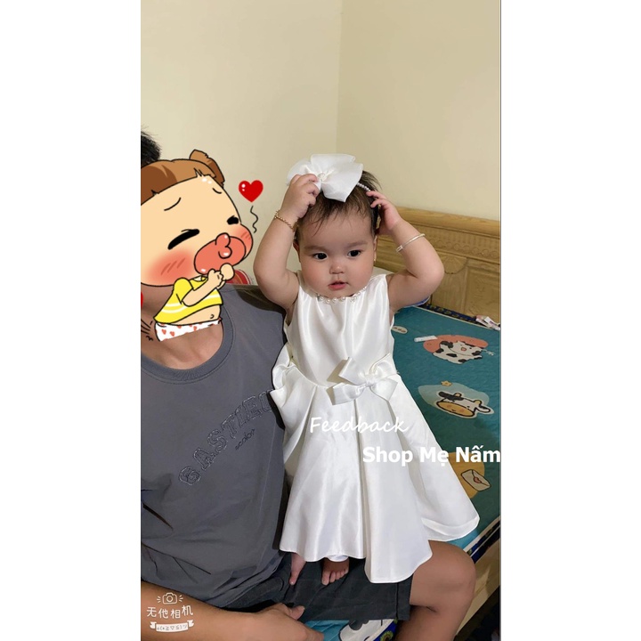 Váy trắng nơ 4 cánh