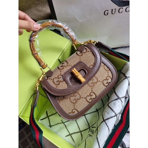 Túi gc quai gỗ logo GG to size22