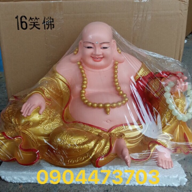 Tượng Phật Di Lặc ngồi cao 25cm, ngang 43cm màu vàng