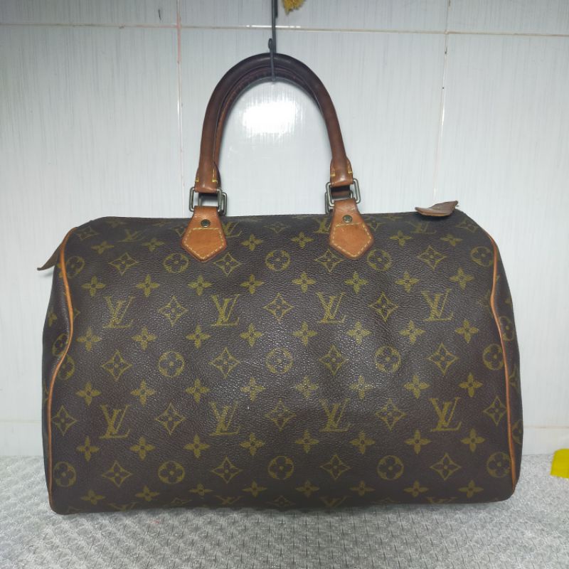 Túi xách si hiệu eo Vì