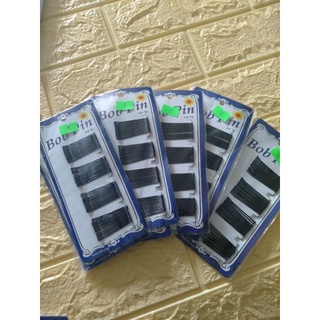 Một vỉ gim cài tóc đen