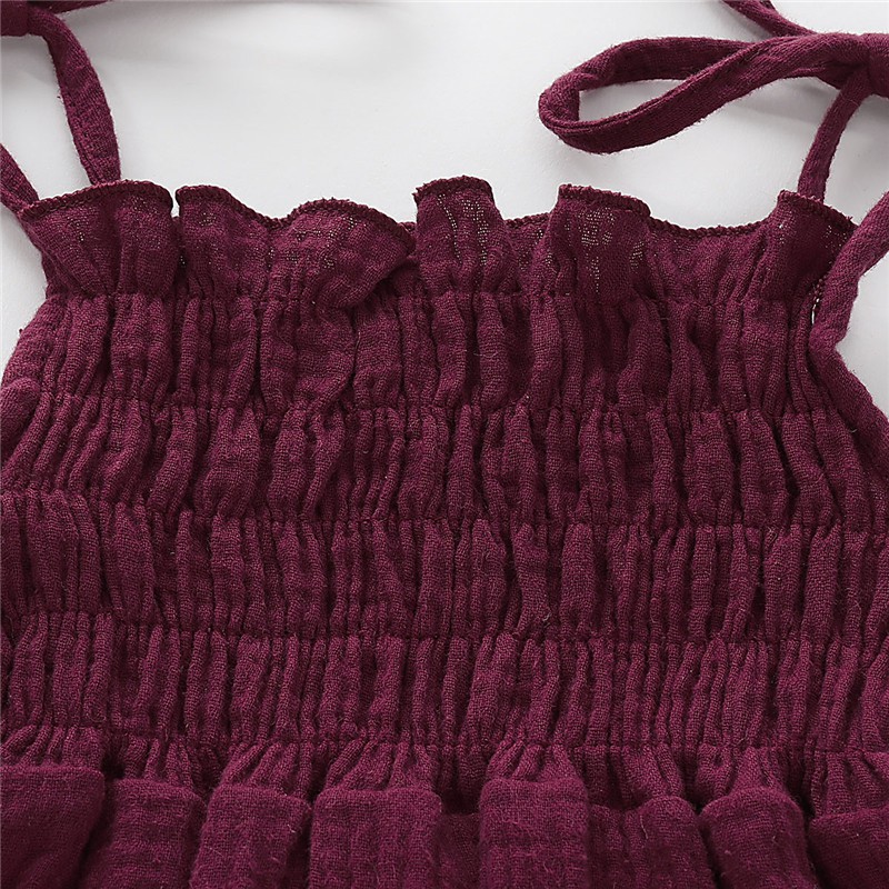 Bộ jumpsuit Mikrdoo chất liệu cotton màu trơn phối bèo cho bé gái