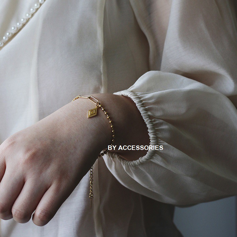 Lắc tay titan xích và bi tròn phối mặt hình thoi không gỉ