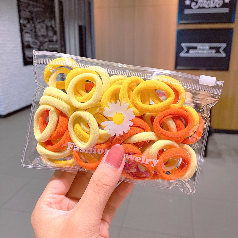 Túi 50 dây thun nhỏ cho bé cột tóc bằng vải nhiều màu sắc giá rẻ trang trí hoa cúc trong suốt CB23