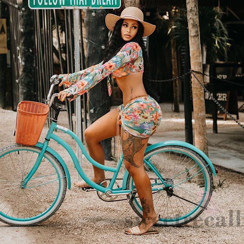 Bộ đồ 2 món áo croptop tay dài cổ chữ V buộc dây in họa tiết hoa + chân váy dây rút thời trang đi biển cho nữ | BigBuy360 - bigbuy360.vn