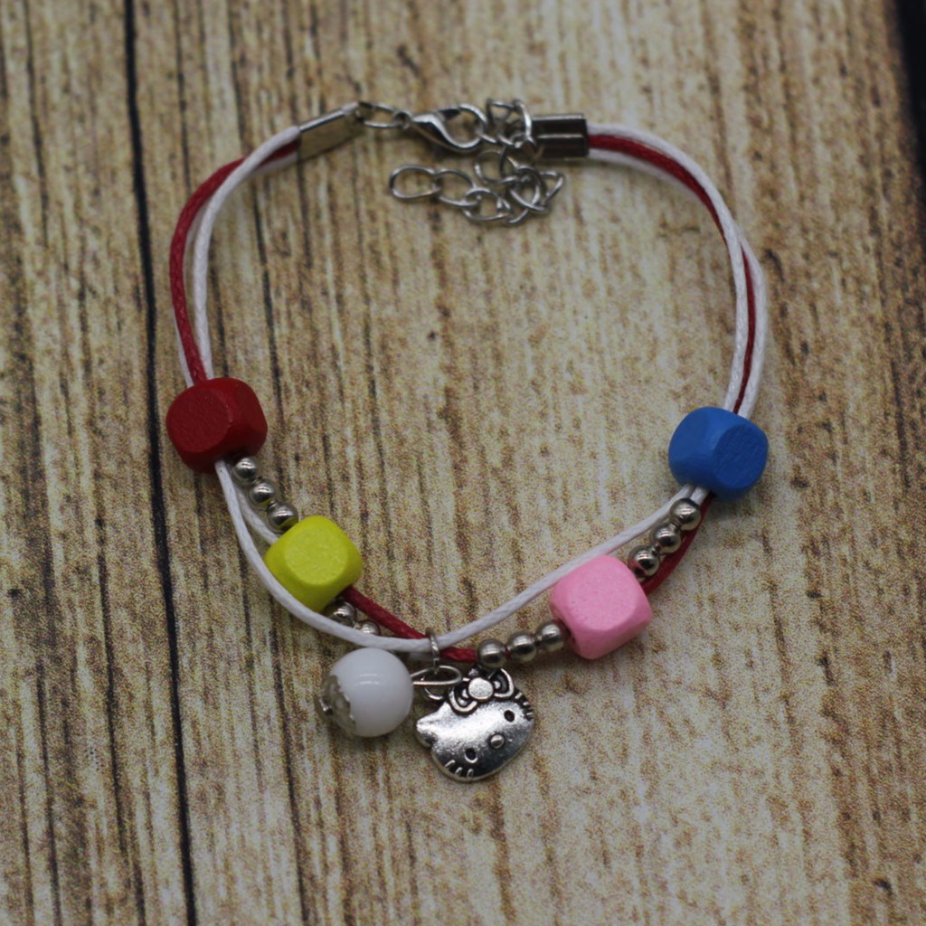 VT41 Vòng tay hạt gỗ mix charm 5 cái/lốc