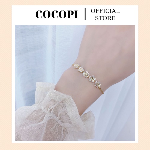 Lắc tay Vòng tay dây rút mảnh gắn hoa mai phong cách nữ tính Cocopi.accessories - LT011