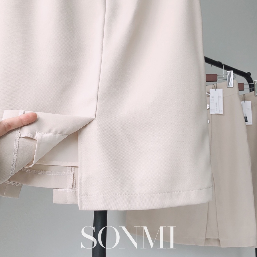 Chân Váy Công Sở Chữ A SONMI Hàn Quốc Cao Cấp Màu Be Xẻ Tà Cách Điệu Vạt Chéo NEVAEH QUINN