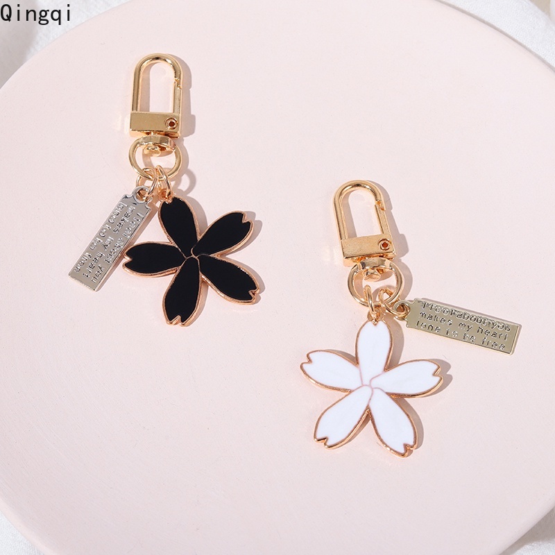 Móc khóa Miss Zoe kim loại hình bông hoa màu xanh dương/ trắng/ hồng/ đen dành cho cặp đôi/ bạn bè