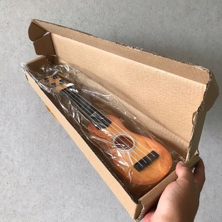 Ukulele siêu dễ thương cho bé tập chơi