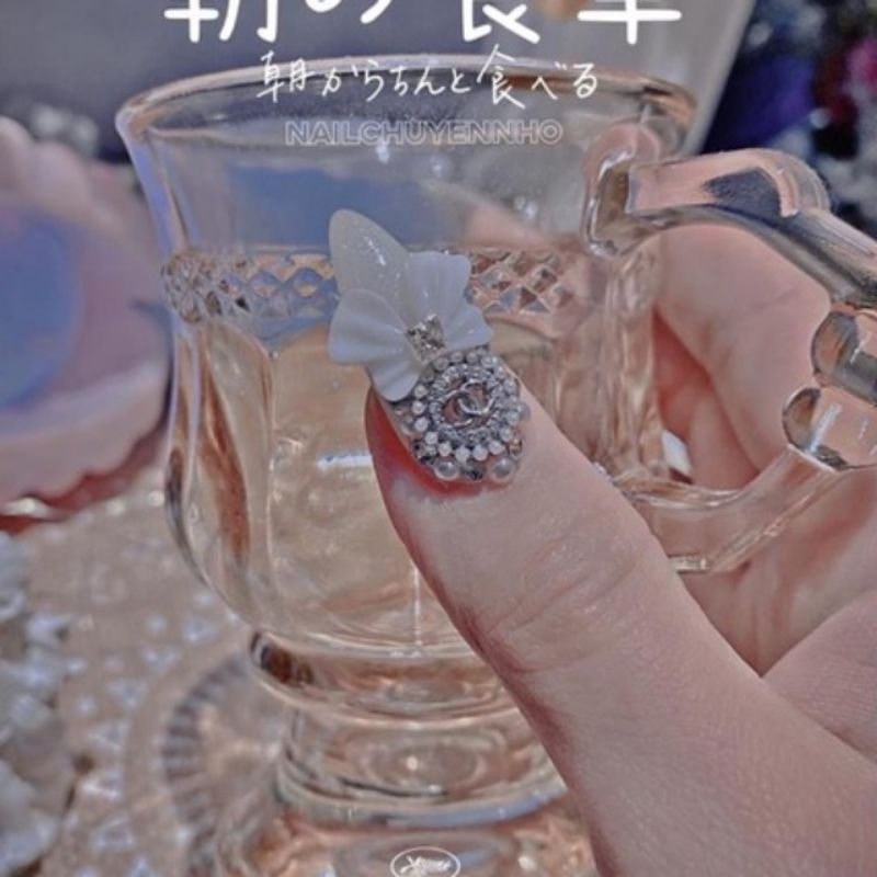 Charm nơ đen trắng quốc dân trang trí móng nail