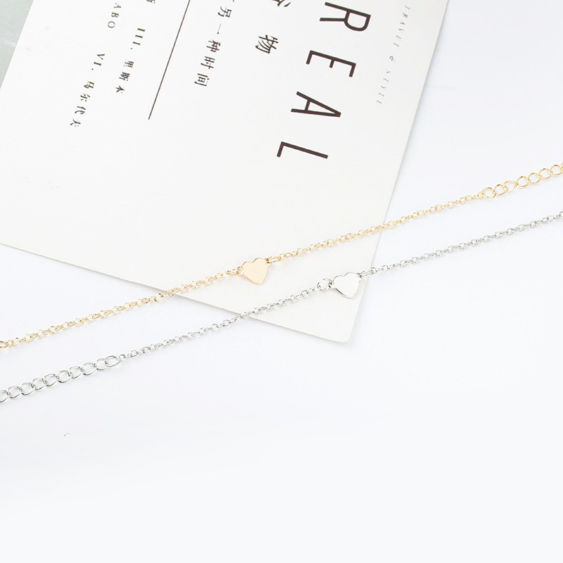 Vòng đeo tay bằng hợp kim mặt hình trái tim phong cách Hàn Quốc thời trang