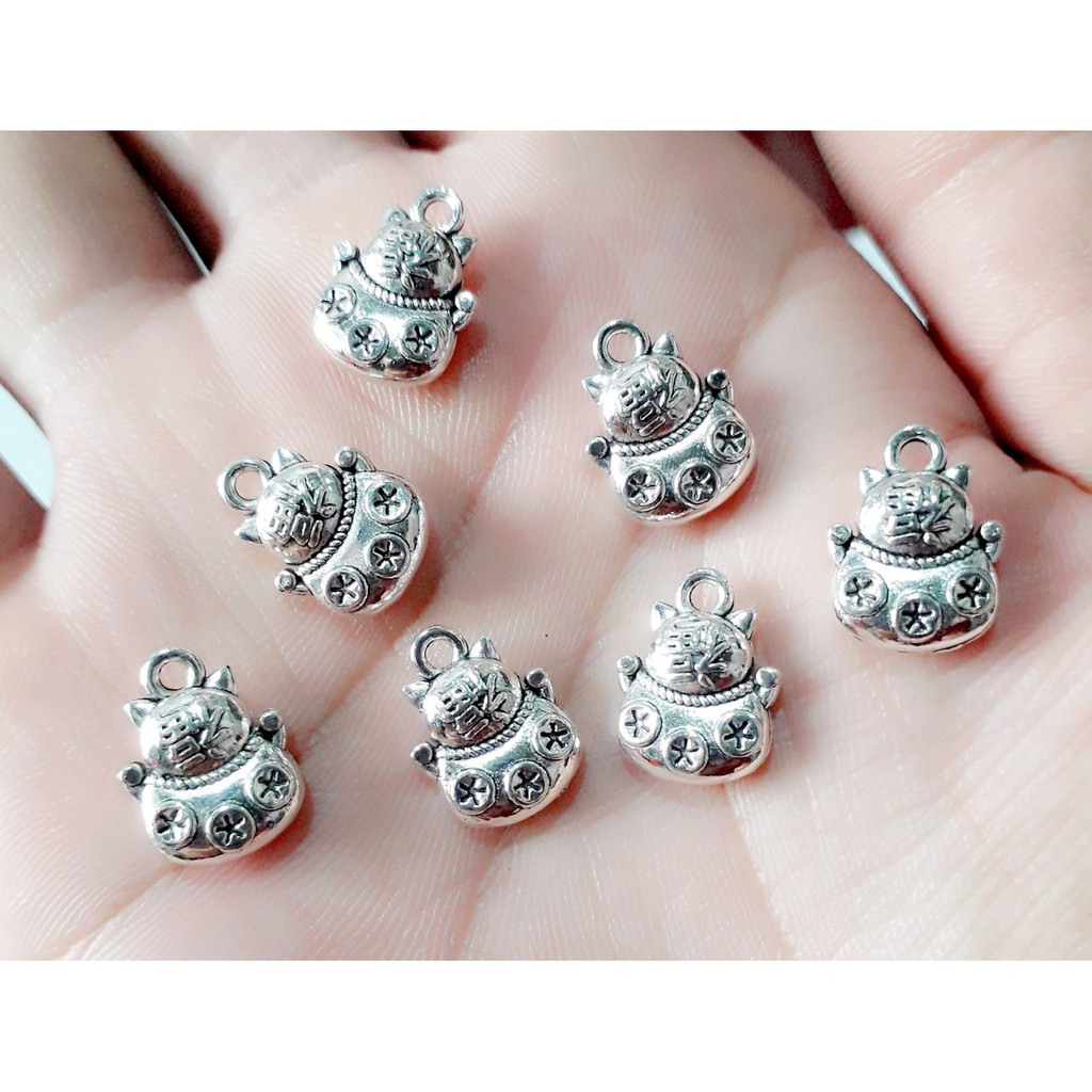 Sỉ charm bạc cổ chất liệu Hợp Kim handmade : 50g = 25k / 1 gói