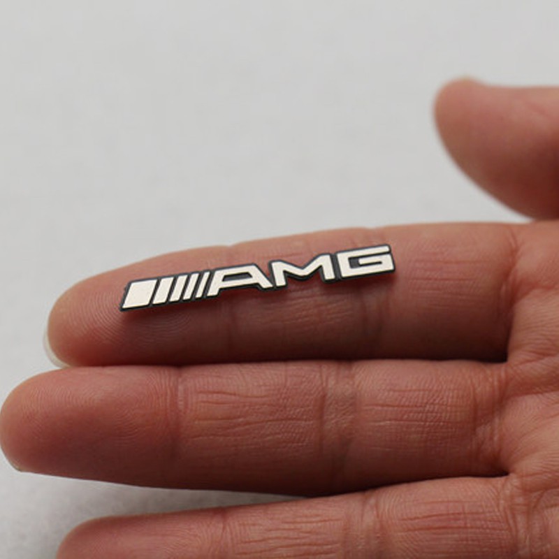 Set 2 logo AMG dán vô lăng xe hơi Mercedes