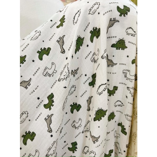 vải xô muslin 2 lớp con khủng long xanh đen nền trắng