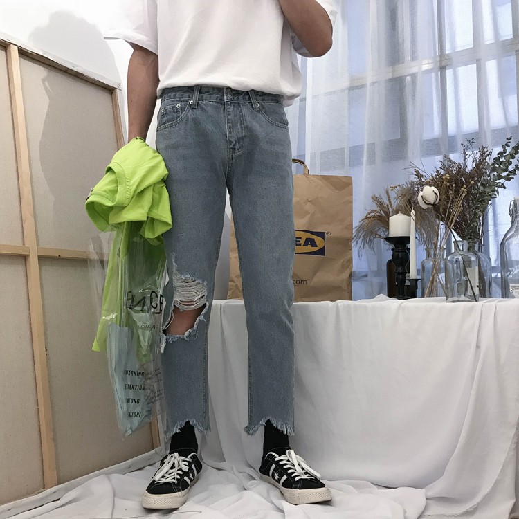 Quần Baggy Jean rách gối - Gấu lệch tua rua