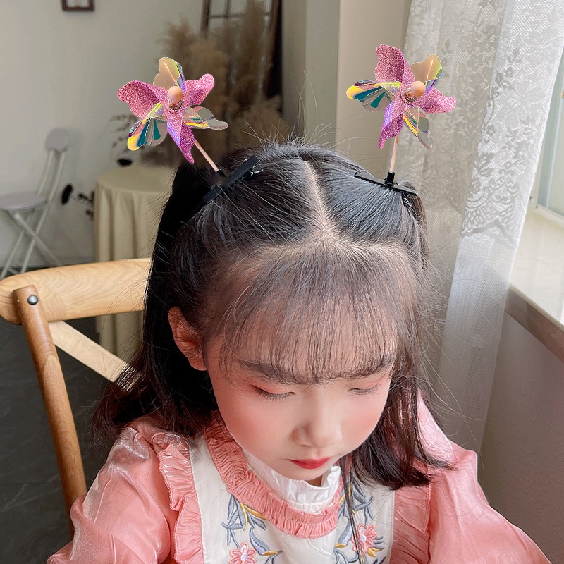 Kẹp Tóc Hình Bánh Xe Xoay Tròn Dễ Thương Cho Bé