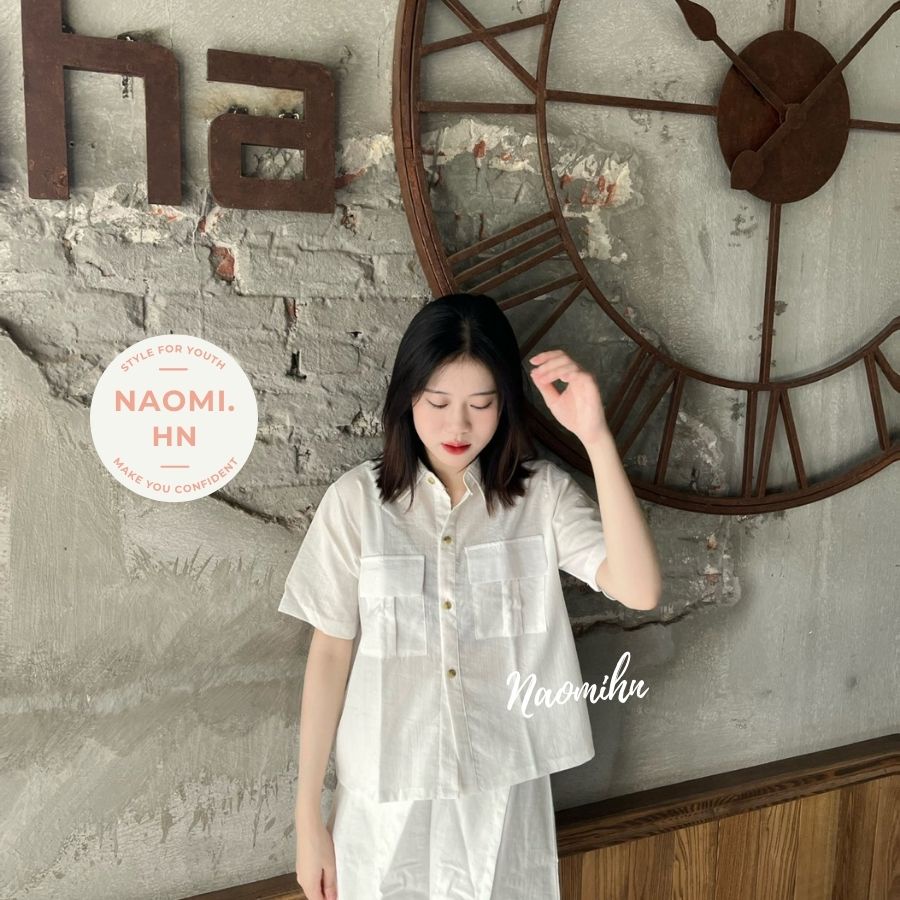 Set đồ nữ sơ mi cộc tay túi ngực form croptop kèm quần giả váy ngắn vạt lệch chất đũi siêu thích. Set basic nhiều màu