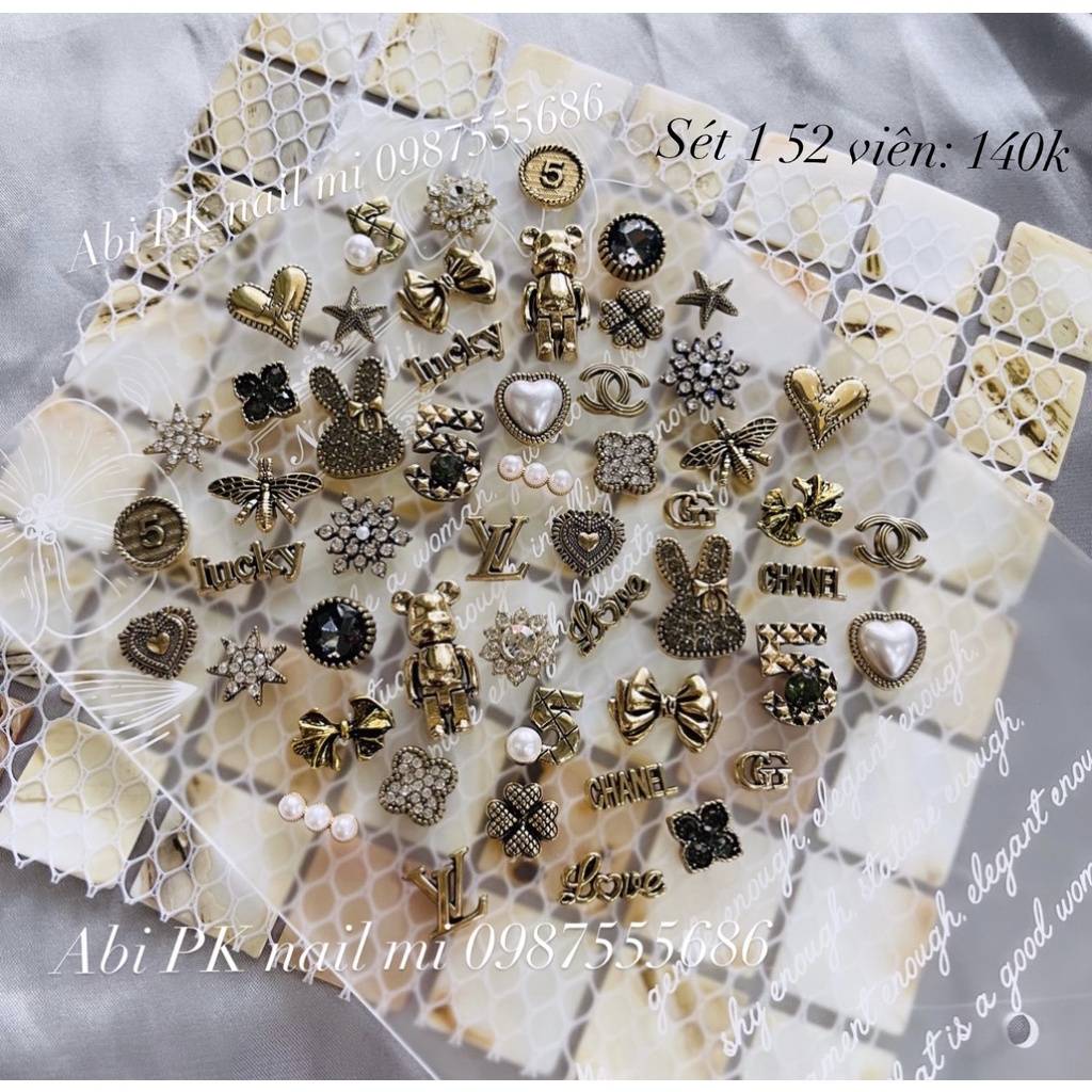Set charm đồng 52 cái