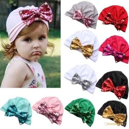 Mũ turban trang trí nơ đính kim tuyến lấp lánh cho bé