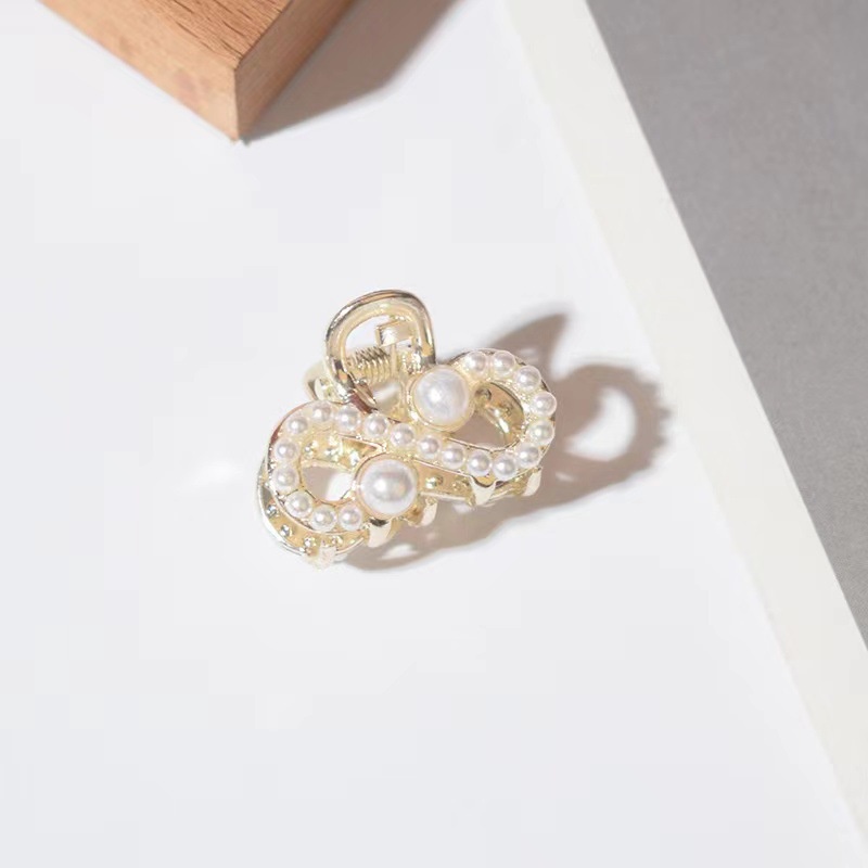 Kẹp tóc nơ đính ngọc trai dễ thương