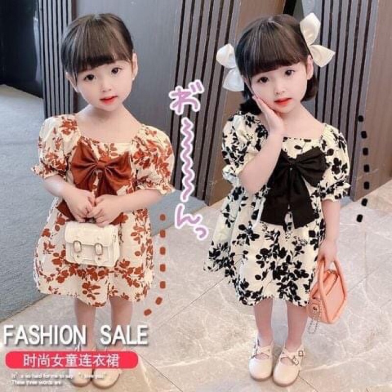 Váy Xinh Cho Bé Gái 6-18kg LINA KIDS Váy hoa phối nơ trước ngực.