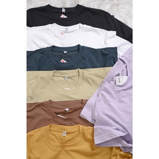 Áo thun cotton UNQL tà lệch xẻ 2 bên