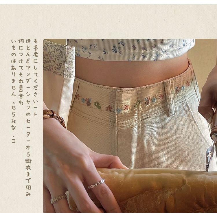 Quần Jean Dài Kaki Nữ Lưng Cao Màu Trắng Kem Thêu Hoa Cạp Ống Rộng Phong Cách Cá Tính J1981