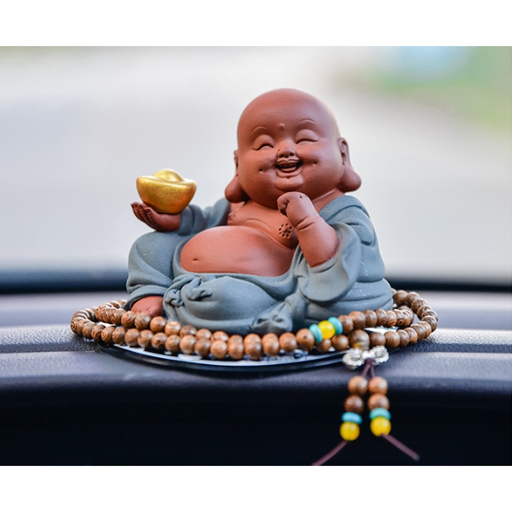 Tượng Phật Di Lặc ngồi thư thái cầm đỉnh vàng - gốm tử sa