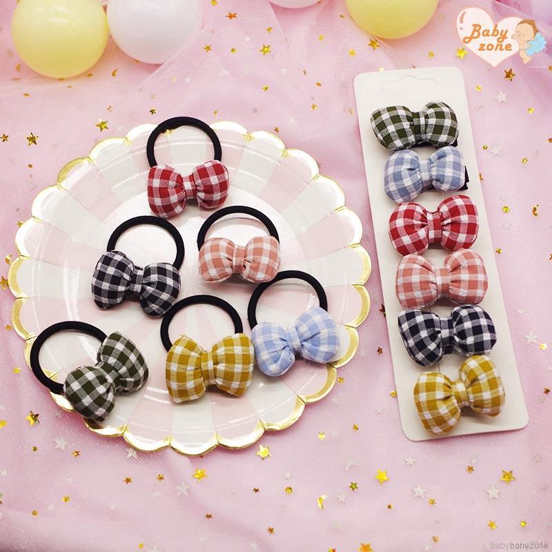 Băng đô nơ họa tiết ca rô đính nơ đáng yêu dành cho bé gái