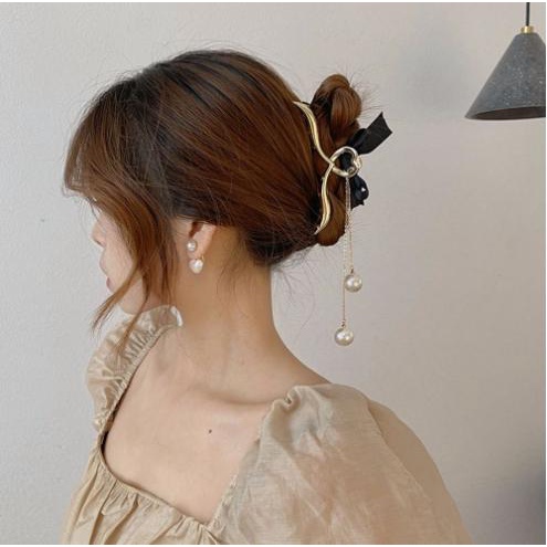 Kẹp tóc càng cua có tua rua đính nơ xinh xắn DTonline