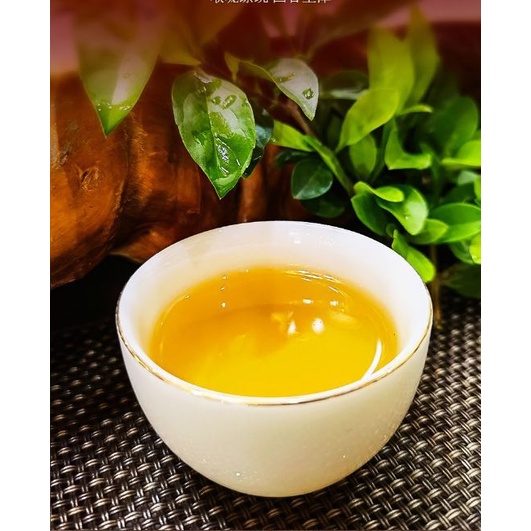 Bánh Trà Phổ Nhĩ Sống Mãnh Hải Vân Nam 357 gram (Trà Cổ Thụ Khổng Tước)