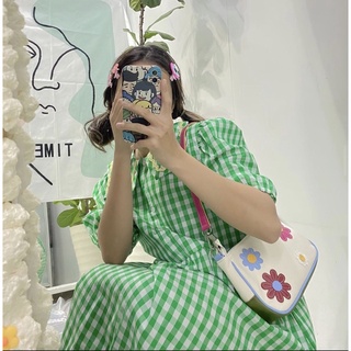 Đầm babydoll caro xanh lá cavangclothing