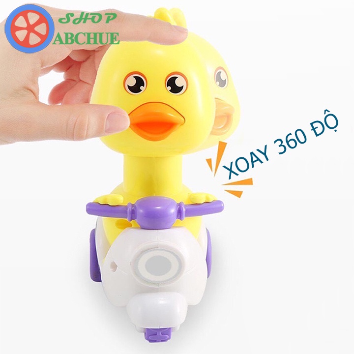 Đồ chơi trẻ em vịt con chạy xe vespa