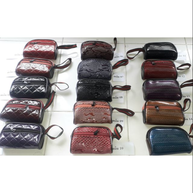 Một cái ví_bóp da Pu mini đa năng 2 dây kéo kích thước 10x6x3 cm rất đẹp
