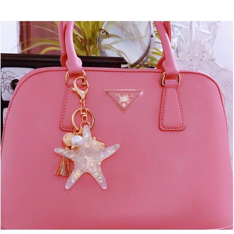 MÓC KHÓA SAO BIỂN DẠ QUANG