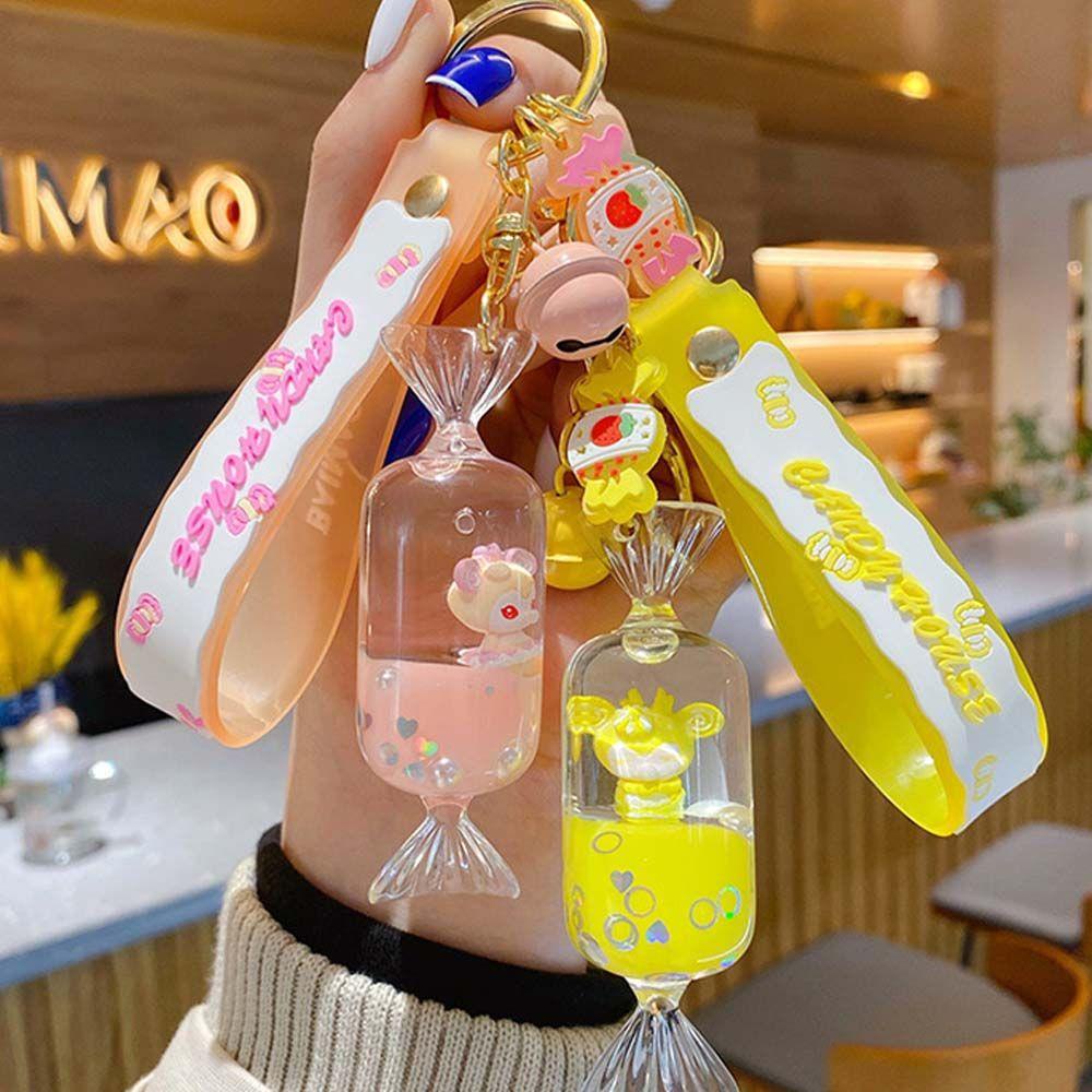 Móc Khóa Cặp Đôi Búp Bê Hoạt Hình Bằng Acrylic Phối Cát Lún Sáng Tạo