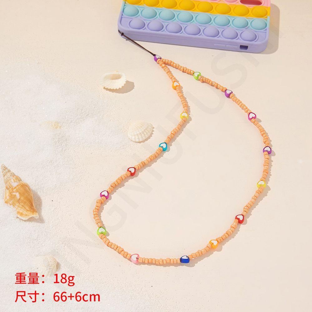 Dây Đeo Điện Thoại Xỏ Hạt Hình Trái Tim Nhiều Màu Chống Thất Lạc Cho Nữ