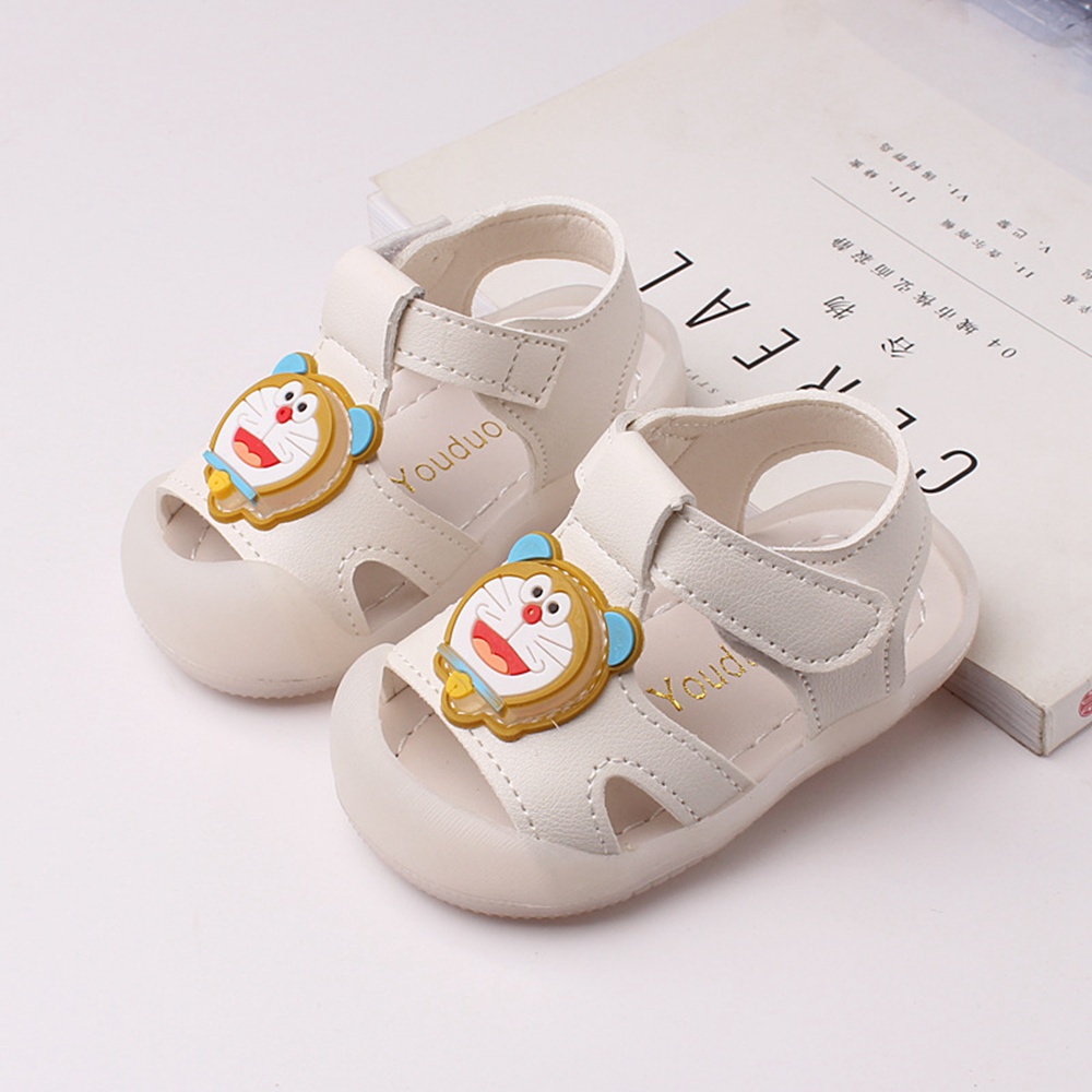 Xăng đan Mềm Hở Ngón Chống Trượt In Hình Doraemon Hoạt Hình Có Khóa Dán Chống Trượt Dành Cho Bé Trai Gái 1-2 Tuổi