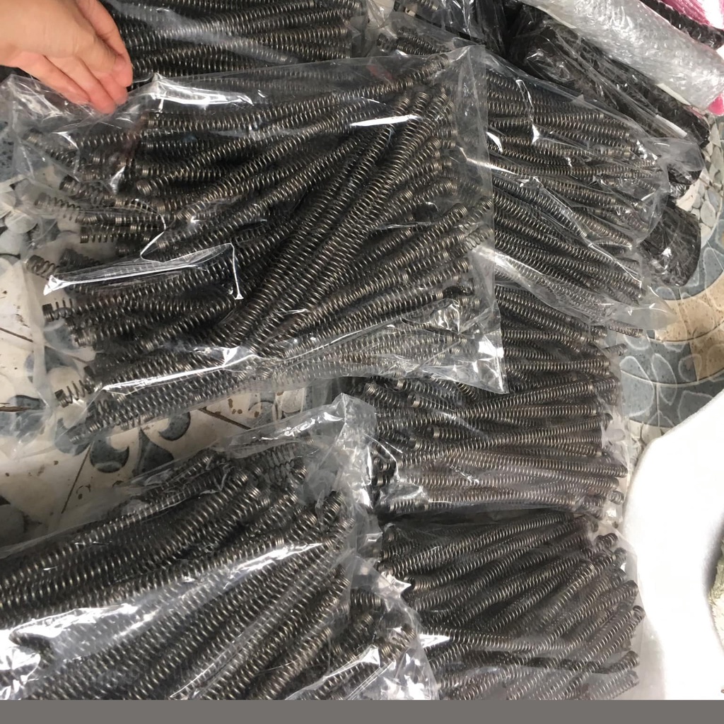 Lò xo chống rung lắc máy giặt