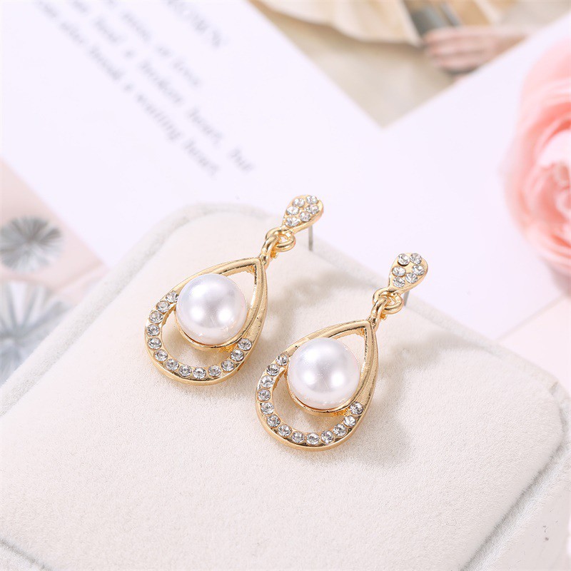 Bộ dây chuyền + bông tai đính hạt ngọc trai kiểu dáng sành điệu