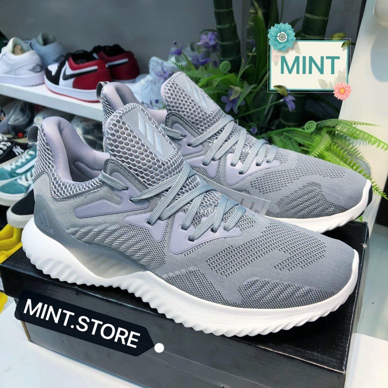 Video cận cảnh) Giày thể thao sneaker alphabounce xám đế trắng